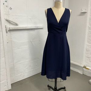 Bold navy strapped back A OK dress made by OAK